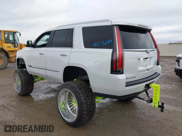 2020 Cadillac Escalade Luxury z VIN 1GYS3BKJ6LR124477, wystawiony jako IAAI lot #41471894 z przebiegiem 42 439 mil mil oraz . Historia ofert i sprzedaży dostępna na DreamBid. Obrazek 3.