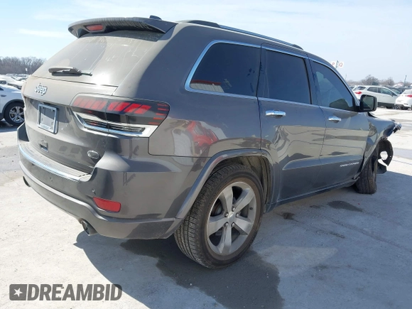 2015 Jeep Grand Cherokee Overland with VIN 1C4RJECT2FC648292, listed as a IAAI auction lot 41806402 with 116,766 mi miles. Bid and sale history available at carsss.com. Image 4.