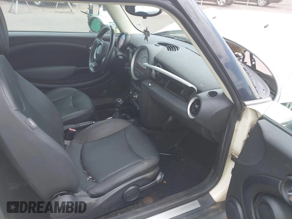 2012 MINI Hardtop with VIN WMWSU3C54CT262450, listed as a IAAI auction lot 42148430 with 55,250 mi miles and . Bid and sale history available at DreamBid. Image 5.