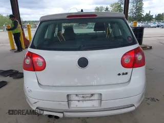 2007 Volkswagen Rabbit z VIN WVWBR71K67W191437, wystawiony jako IAAI lot #42082924 z przebiegiem 183 154 mil mil oraz . Historia ofert i sprzedaży dostępna na DreamBid. Obrazek 16.