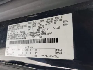 2016 Ford Transit Cargo with VIN 1FTYE1YM5GKB54302, listed as a IAAI auction lot 40715142 with 119,047 mi miles. Bid and sale history available at carsss.com. Image 8.