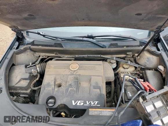 2013 Cadillac SRX Premium Collection с VIN 3GYFNJE39DS650569, выставлен на аукционе Copart как лот 59947905 с пробегом 146 548 миль миль и Списание • Salvage title. История ставок и продаж доступна на DreamBid. Изображение 12.