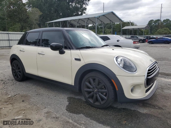 2021 MINI Hardtop 4 Door Oxford Edition with VIN WMWXU7C07M2N06066, listed as a Copart auction lot 68949904 with 56,378 mi miles and Salvage Title. Bid and sale history available at carsss.com. Image 4.
