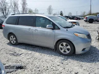 2013 Toyota Sienna LE AAS with VIN 5TDKK3DC7DS369935, listed as a Copart auction lot 54296325 with 193,635 mi miles and Clean Title. Bid and sale history available at DreamBid. Image 4.