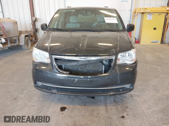2012 Chrysler Town & Country Touring with VIN 2C4RC1BG6CR208571, listed as a IAAI auction lot 42098322 with 159,903 mi miles and . Bid and sale history available at DreamBid. Image 6.