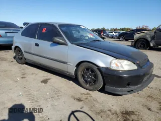 1998 Honda Civic CX with VIN 2HGEJ6325WH112575, listed as a Copart auction lot 77186644 with 147,976 mi miles and Salvage Title. Bid and sale history available at carsss.com. Image 4.