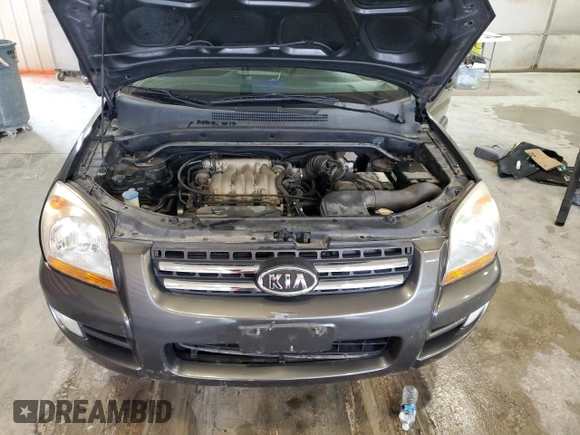 2005 Kia Sportage LX with VIN KNDJE723X57131795, listed as a Copart auction lot 79035214 with 146,746 mi miles and Salvage Title. Bid and sale history available at carsss.com. Image 13.