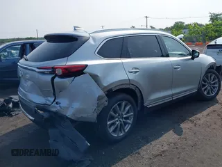 2020 Mazda CX-9 Grand Touring with VIN JM3TCBDY6L0424584, listed as a IAAI auction lot 42473920 with 32,385 mi miles and . Bid and sale history available at DreamBid. Image 4.
