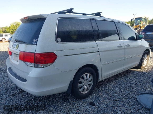 2009 Honda Odyssey EX-L with VIN 5FNRL38799B404379, listed as a IAAI auction lot 41990398 with 224,859 mi miles and . Bid and sale history available at DreamBid. Image 4.