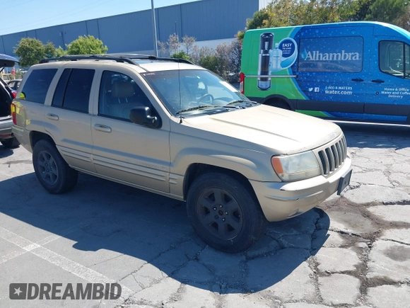 2000 Jeep Grand Cherokee Laredo z VIN 1J4G258S5YC237373, wystawiony jako IAAI lot #42736569 z przebiegiem 103 310 mil mil oraz . Historia ofert i sprzedaży dostępna na DreamBid. Obrazek 6.