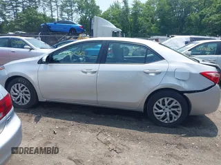 2018 Toyota Corolla L with VIN 2T1BURHE8JC116054, listed as a IAAI auction lot 42450016 with 65,342 mi miles and . Bid and sale history available at DreamBid. Image 14.