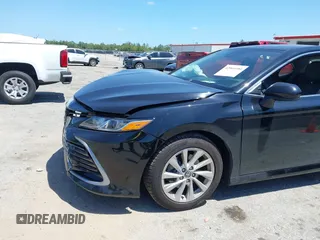 2023 Toyota Camry LE z VIN 4T1C11AK2PU120803, wystawiony jako IAAI lot #42060384 z przebiegiem 38 897 mil mil oraz . Historia ofert i sprzedaży dostępna na DreamBid. Obrazek 6.