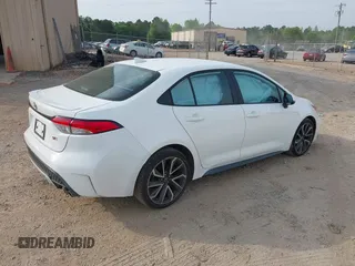 2022 Toyota Corolla SE with VIN 5YFS4MCE0NP136332, listed as a IAAI auction lot 42094001 with 36,371 mi miles and . Bid and sale history available at DreamBid. Image 4.
