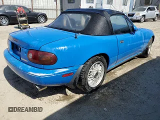1991 Mazda MX-5 Miata Special Edition z VIN JM1NA3510M1218378, wystawiony jako Copart lot #57149615 z przebiegiem 147 632 mil mil oraz Czysty tytuł • Clean title. Historia ofert i sprzedaży dostępna na DreamBid. Obrazek 3.