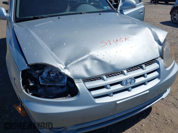 2005 Hyundai Accent GLS with VIN KMHCG45C75U658672, listed as a IAAI auction lot 42107140 with 34,351 mi miles. Bid and sale history available at carsss.com. Image 6.