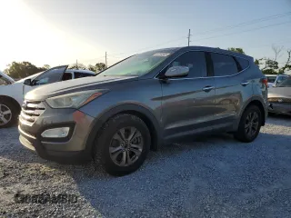 2014 Hyundai Santa Fe with VIN 5XYZU3LB9EG125526, listed as a Copart auction lot 63230345 with 115,388 mi miles and Clean title. Bid and sale history available at DreamBid. Image 1.