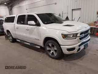2019 Ram 1500 Laramie with VIN 1C6SRFRT2KN774858, listed as a IAAI auction lot 42289063 with 126,429 mi miles and . Bid and sale history available at DreamBid. Image 1.