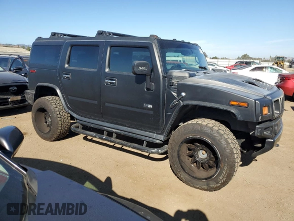 2006 Hummer H2 with VIN 5GRGN23U96H101430, listed as a Copart auction lot 75453514 with 168,958 mi miles and Salvage Title. Bid and sale history available at carsss.com. Image 4.