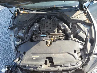 2014 Infiniti Q50 с VIN JN1BV7APXEM683701, выставлен на аукционе Copart как лот 47630075 с пробегом 102 704 миль миль и Списание • Salvage title. История ставок и продаж доступна на DreamBid. Изображение 11.