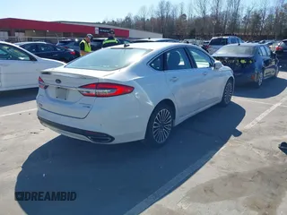 2018 Ford Fusion Titanium with VIN 3FA6P0D93JR162212, listed as a IAAI auction lot 41767723 with 134,010 mi miles and . Bid and sale history available at DreamBid. Image 4.