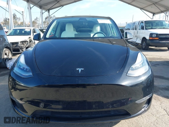 2021 Tesla Model Y Performance with VIN 5YJYGDEF1MF092889, listed as a IAAI auction lot 42076715 with 48,373 mi miles and . Bid and sale history available at DreamBid. Image 12.