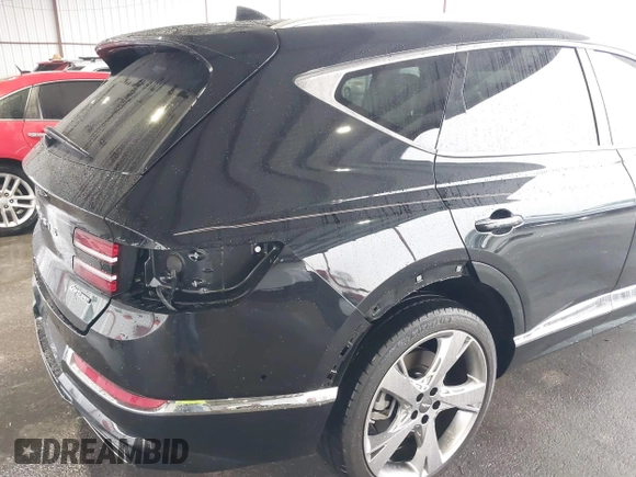 2021 Genesis GV80 with VIN KMUHCESC1MU046768, listed as a IAAI auction lot 41424946 with 18,471 mi miles and . Bid and sale history available at DreamBid. Image 18.