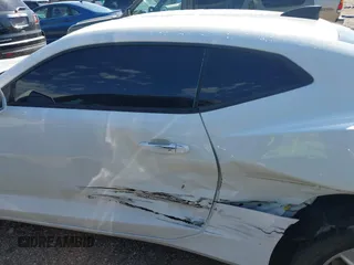 2019 Chevrolet Camaro 1LT z VIN 1G1FB1RX0K0149384, wystawiony jako IAAI lot #42106283 z przebiegiem 61 738 mil mil oraz . Historia ofert i sprzedaży dostępna na DreamBid. Obrazek 14.
