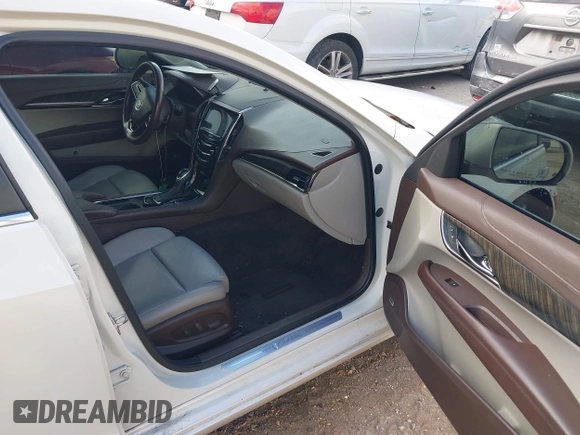 2013 Cadillac ATS Performance z VIN 1G6AC5S36D0111225, wystawiony jako IAAI lot #41511694 z przebiegiem 153 250 mil mil oraz . Historia ofert i sprzedaży dostępna na DreamBid. Obrazek 5.