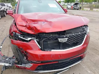 2024 Cadillac XT6 AWD Premium Luxury with VIN 1GYKPDRSXRZ724989, listed as a IAAI auction lot 42378559 with 22,520 mi miles and . Bid and sale history available at DreamBid. Image 6.