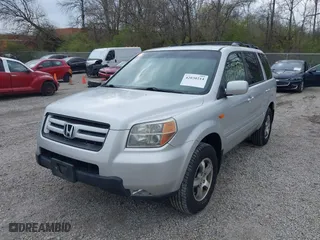 2007 Honda Pilot EX with VIN 5FNYF18457B009707, listed as a IAAI auction lot 42030214 with 229,462 mi miles. Bid and sale history available at carsss.com. Image 2.