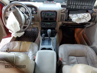 2002 Jeep Grand Cherokee Limited с VIN 1J4GW58N22C126821, выставлен на аукционе Copart как лот 46304015 с пробегом 157 932 миль миль и Списание • Salvage title. История ставок и продаж доступна на DreamBid. Изображение 8.