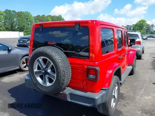2021 Jeep Wrangler Unlimited Sahara with VIN 1C4HJXEN8MW622359, listed as a IAAI auction lot 42328958 with 100,450 mi miles and . Bid and sale history available at DreamBid. Image 4.