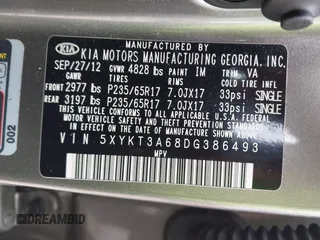 2013 Kia Sorento LX z VIN 5XYKT3A68DG386493, wystawiony jako IAAI lot #42102477 z przebiegiem 196 351 mil mil oraz . Historia ofert i sprzedaży dostępna na DreamBid. Obrazek 9.