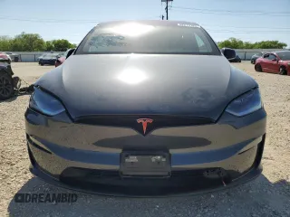 2023 Tesla Model X with VIN 7SAXCDE5XPF422163, listed as a Copart auction lot 52573185 with Not Provided miles and Salvage Title. Bid and sale history available at DreamBid. Image 5.