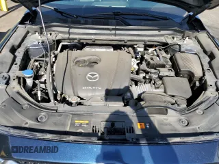 2021 Mazda CX-5 Grand Touring with VIN JM3KFBDM3M1344784, listed as a Copart auction lot 58051445 with 69,593 mi miles and Salvage title. Bid and sale history available at DreamBid. Image 12.