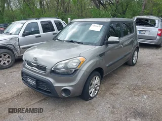 2012 Kia Soul + with VIN KNDJT2A65C7403493, listed as a IAAI auction lot 42095119 with 151,258 mi miles. Bid and sale history available at carsss.com. Image 2.