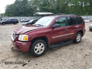 2005 GMC Envoy SLE with VIN 1GKDS13S952176396, listed as a Copart auction lot 59637195 with 194,564 mi miles and Salvage title. Bid and sale history available at DreamBid. Image 1.