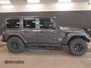 2018 Jeep Wrangler Unlimited Sport S с VIN 1C4HJXDG7JW280918, выставлен на аукционе IAAI как лот 41998831 с пробегом 66 539 миль миль и . История ставок и продаж доступна на DreamBid. Изображение 13.