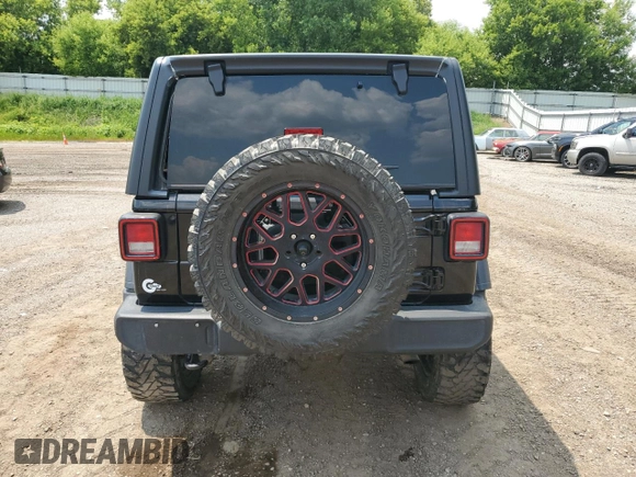2020 Jeep Wrangler Unlimited Sport Altitude with VIN 1C4HJXDG2LW102854, listed as a Copart auction lot 60245695 with 134,575 mi miles and Non repairable. Bid and sale history available at DreamBid. Image 6.