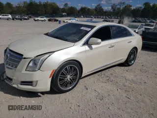 2014 Cadillac XTS Platinum z VIN 2G61T5S39E9187187, wystawiony jako Copart lot #76316134 z przebiegiem 262 508 mil mil oraz Szkoda całkowita • Salvage title. Historia ofert i sprzedaży dostępna na DreamBid. Obrazek 1.