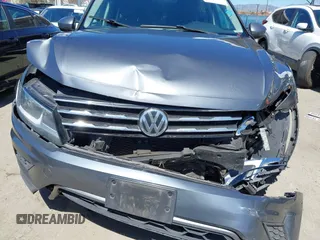 2019 Volkswagen Tiguan S z VIN 3VV1B7AX0KM043032, wystawiony jako IAAI lot #41862179 z przebiegiem 154 440 mil mil oraz . Historia ofert i sprzedaży dostępna na DreamBid. Obrazek 6.