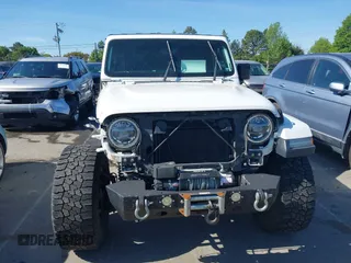 2018 Jeep Wrangler Unlimited Sahara z VIN 1C4HJXEG4JW106111, wystawiony jako IAAI lot #41994833 z przebiegiem 99 583 mil mil oraz . Historia ofert i sprzedaży dostępna na DreamBid. Obrazek 13.