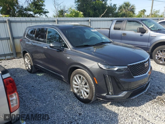 2021 Cadillac XT6 Premium Luxury with VIN 1GYKPCRS1MZ199288, listed as a Copart auction lot 54264995 with 51,432 mi miles and Salvage Title. Bid and sale history available at carsss.com. Image 4.