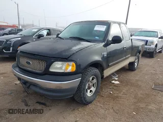 2000 Ford F-150 XL with VIN 1FTRX17L4YKB03771, listed as a IAAI auction lot 41668491 with 1 mi miles. Bid and sale history available at carsss.com. Image 17.