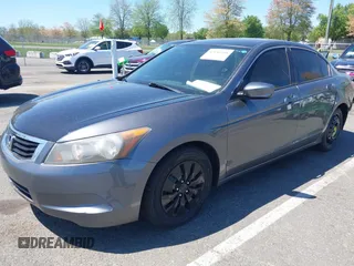 2009 Honda Accord LX с VIN JHMCP26339C015382, выставлен на аукционе IAAI как лот 42136568 с пробегом 166 086 миль миль и . История ставок и продаж доступна на DreamBid. Изображение 2.