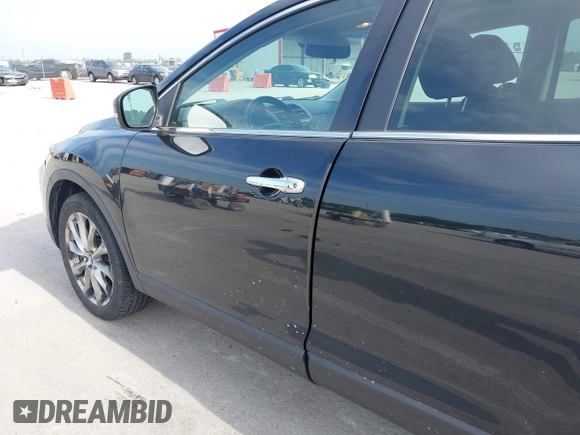 2015 Mazda CX-9 Grand Touring z VIN JM3TB2DA1F0456773, wystawiony jako IAAI lot #42257555 z przebiegiem 152 890 mil mil oraz . Historia ofert i sprzedaży dostępna na DreamBid. Obrazek 19.