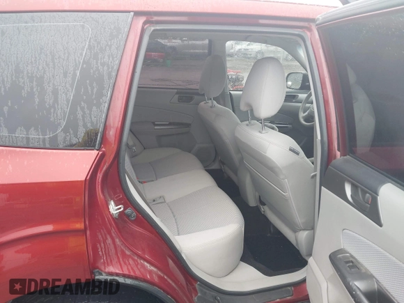 2011 Subaru Forester X with VIN JF2SHBBC0BH722336, listed as a IAAI auction lot 41973327 with 173,935 mi miles and . Bid and sale history available at DreamBid. Image 8.