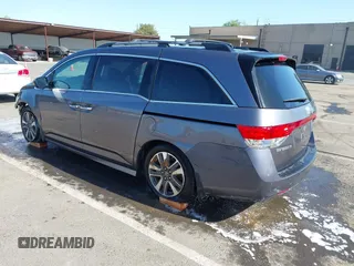 2015 Honda Odyssey Touring Elite с VIN 5FNRL5H93FB056183, выставлен на аукционе IAAI как лот 42073205 с пробегом 119 874 миль миль и . История ставок и продаж доступна на DreamBid. Изображение 3.