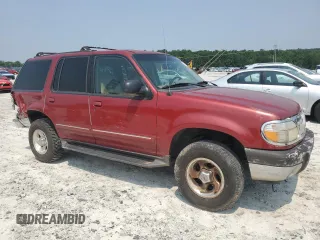 2000 Ford Explorer XLT with VIN 1FMZU73E4YZA72348, listed as a Copart auction lot 59015585 with 182,606 mi miles and Salvage title. Bid and sale history available at DreamBid. Image 4.