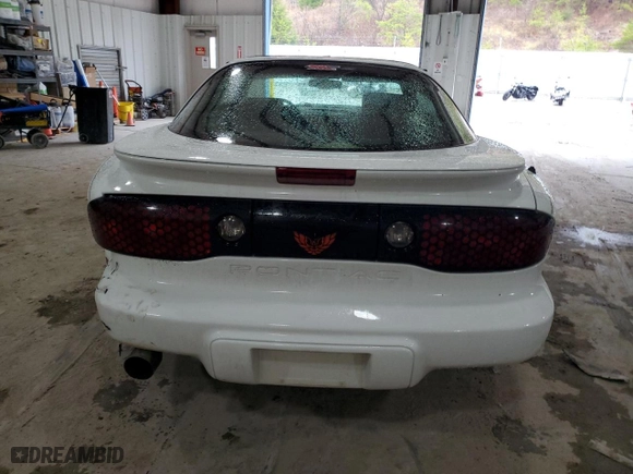 1998 Pontiac Firebird with VIN 2G2FS22KXW2207621, listed as a Copart auction lot 82717434 with 63,973 mi miles and Salvage Title. Bid and sale history available at carsss.com. Image 6.